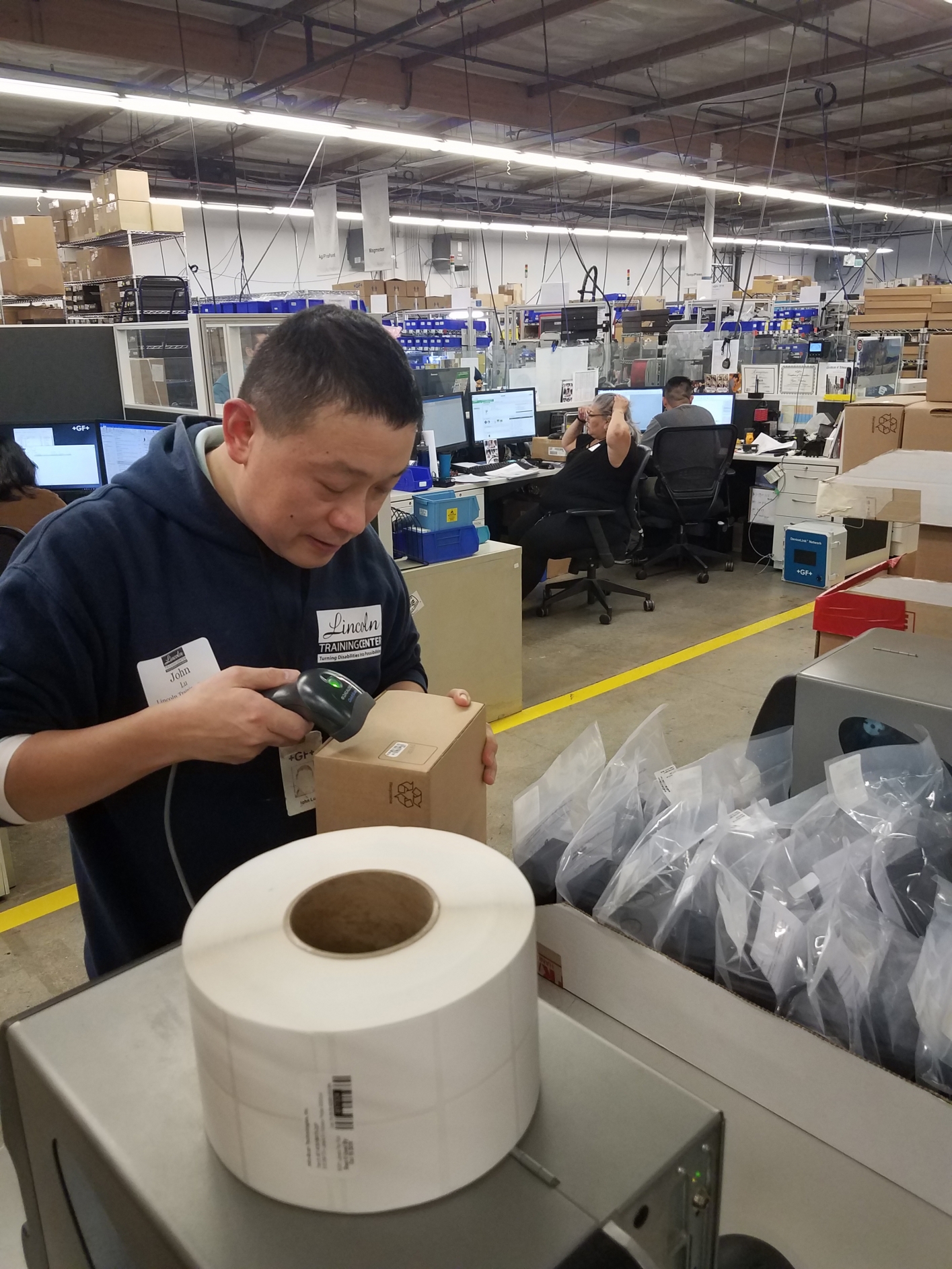 LTC client scanning a product at a warehouse
