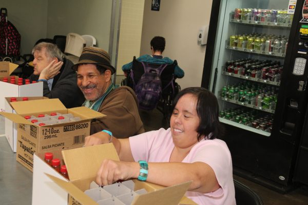 LTC participants packing boxes LTC participants packing boxes